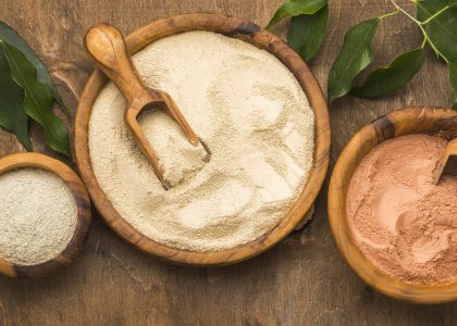 flat-lay-selection-fine-powders-bowls-with-scoops